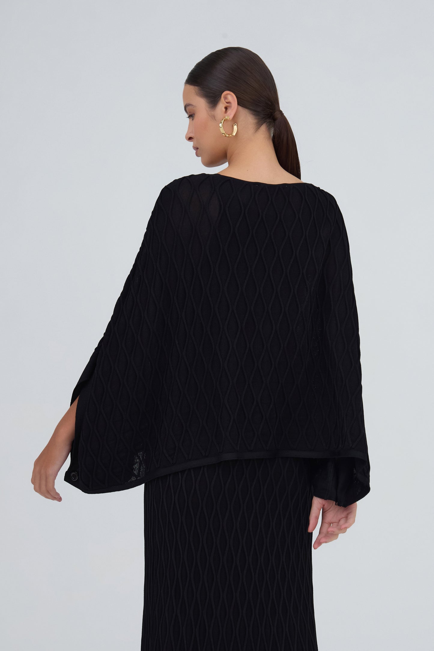 Blusa Ampla Detalhe Nervuras Onduladas Em Tricot Preto